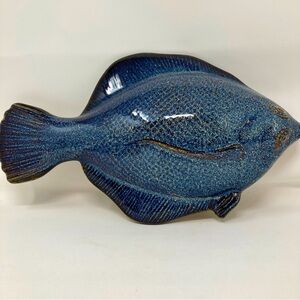 Beautiful blue pottery stingray wall hanging.